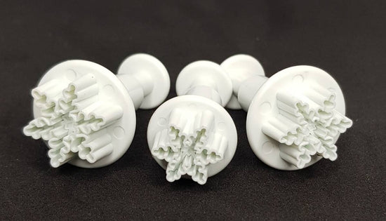 "Mini copos de nieve expulsor"