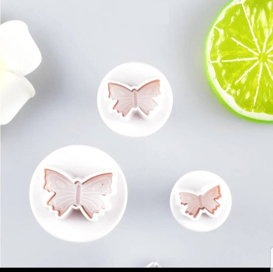 "Expulsor de mini mariposas"