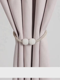 Clic. Magnético para cortinas.